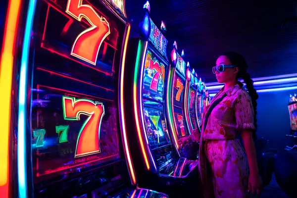A person using their device against a moody casino-themed background, illustrating the smooth re-entry process at JILI7979.